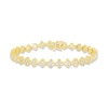 Thumbnail Image 0 of Diamond Flower Line Bracelet 1/3 ct tw Round-cut 10K Yellow Gold 7"