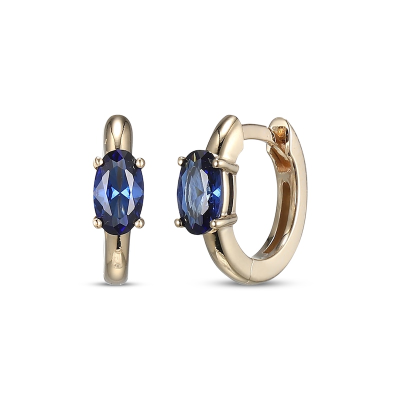 Main Image 1 of Oval-Cut Blue Lab-Created Sapphire Huggie Hoop Earrings 10K Yellow Gold
