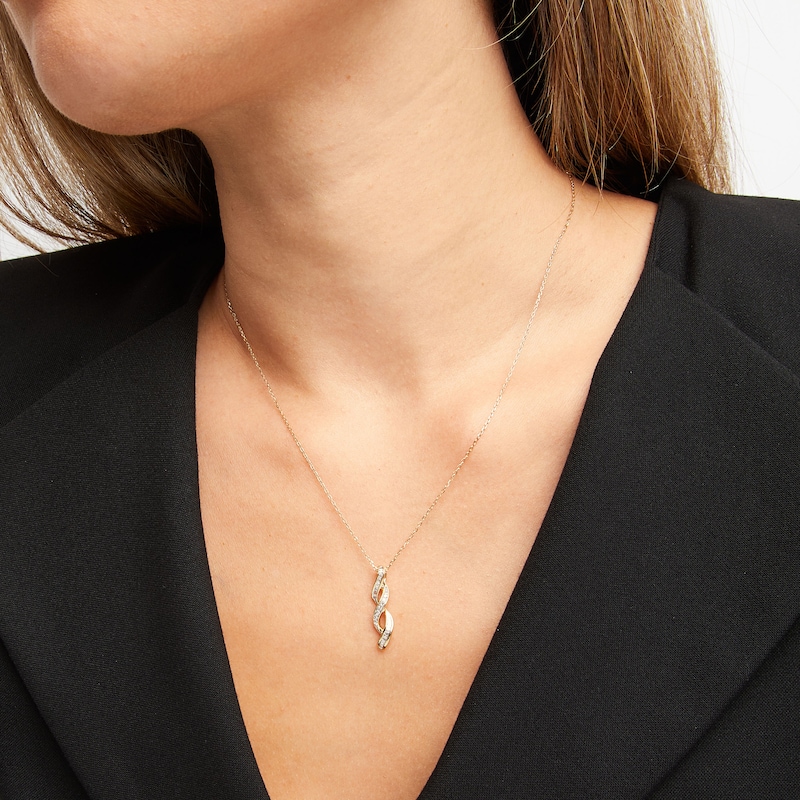 Main Image 2 of Diamond Twist Necklace 1/6 ct tw Round & Baguette-cut 10K Yellow Gold 18&quot;