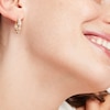 Thumbnail Image 2 of Diamond Oval Hoop Earrings 1/4 ct tw Round-Cut 10K Yellow Gold