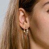 Thumbnail Image 4 of Diamond Twist Hoop Earrings 1/4 ct tw 10K Yellow Gold