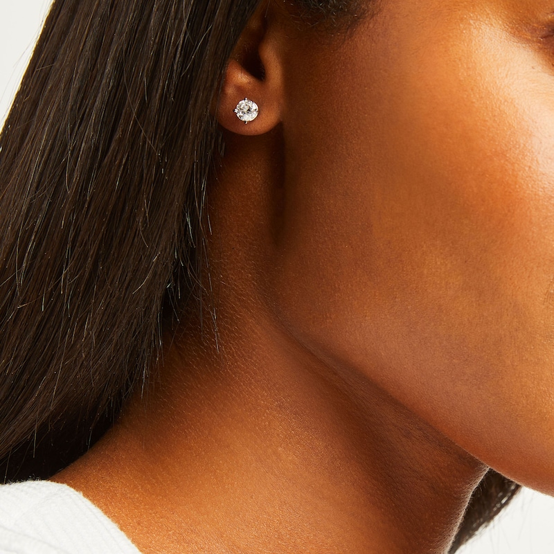 Main Image 4 of Diamond Solitaire Stud Earrings 1-1/5 ct tw Round-cut 14K White Gold (J/I3)