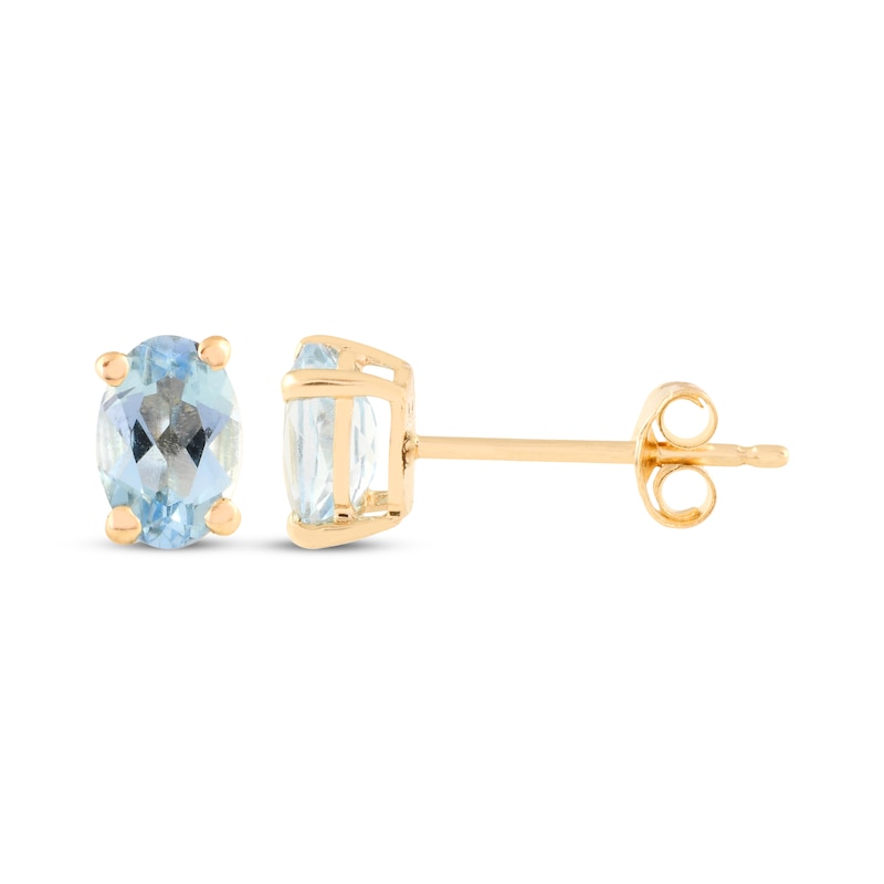 Main Image 1 of Oval-Cut Swiss Blue Topaz Solitaire Stud Earrings 14K Yellow Gold