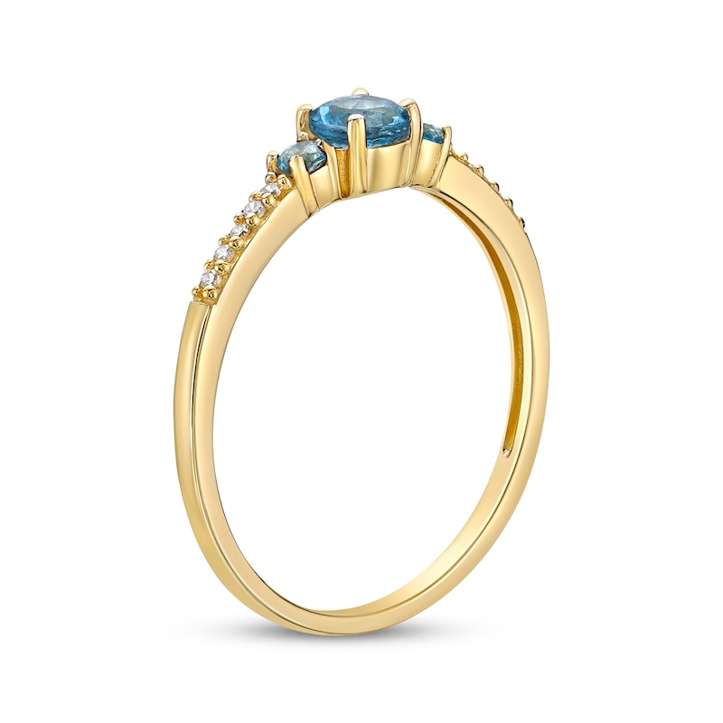Main Image 2 of Blue Topaz & 1/20 ct tw Diamond 3-Stone Ring 10K Yellow Gold