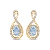Thumbnail Image 1 of Oval-Cut Aquamarine & Round-Cut Diamond Infinity Earrings 1/4 ct tw 10K Yellow Gold