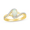Thumbnail Image 1 of Oval-Cut Lab-Created Opal & Diamond Bypass Ring 1/20 ct tw 10K Yellow Gold