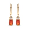 Thumbnail Image 1 of Oval-Cut Mexican Fire Opal & Diamond Drop Earrings 1/15 ct tw 10K Yellow Gold