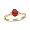 Thumbnail Image 0 of Oval-Cut Mexican Fire Opal & Diamond Ring 1/20 ct tw 10K Yellow Gold
