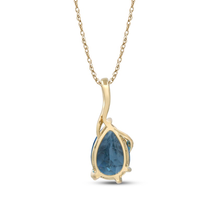 Main Image 3 of Pear-Shaped Swiss Blue Topaz & Diamond Swirl Crossover Necklace 1/8 ct tw 10K Yellow Gold 18&quot;