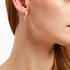 Thumbnail Image 4 of Unstoppable Love Diamond Crossover Double Hoop Earrings 1/4 ct tw 10K Two-Tone Gold