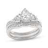 Thumbnail Image 1 of THE LEO Ideal Cut Diamond Pear-Shaped Three-Stone Bridal Set 1-1/8 ct tw 14K White Gold