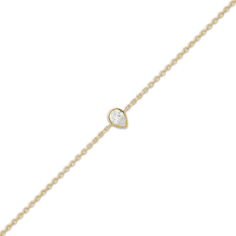Main Image 2 of KAY Lab-Grown Diamonds Pear-Shaped Bezel-Set Solitaire Bracelet 1/8 ct tw 10K Yellow Gold 7.25" (F/SI2)