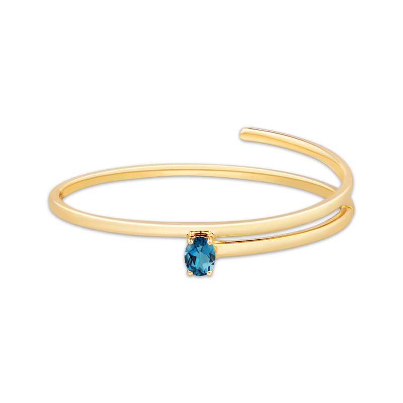 Main Image 1 of STUDIO BY KAY Oval-Cut London Blue Topaz Bypass Bangle Bracelet 24K Yellow Gold Vermeil