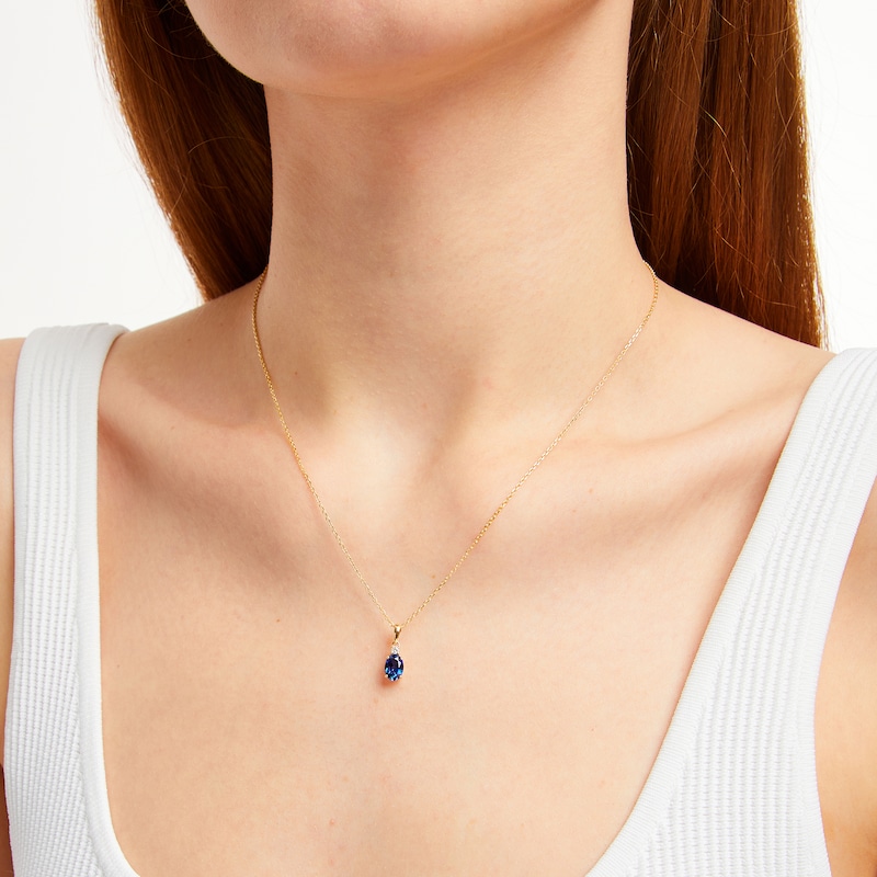 Oval-Cut Blue Lab-Created Sapphire & Diamond Necklace 1/20 ct tw 10K Yellow Gold