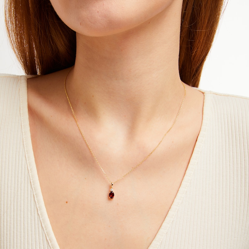 Main Image 3 of Oval-Cut Garnet & Diamond Necklace 1/20 ct tw 10K Yellow Gold