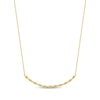 Thumbnail Image 3 of Baguette & Round-Cut Diamond Curved Bar Necklace 1/6 ct tw 10K Yellow Gold 18&quot;