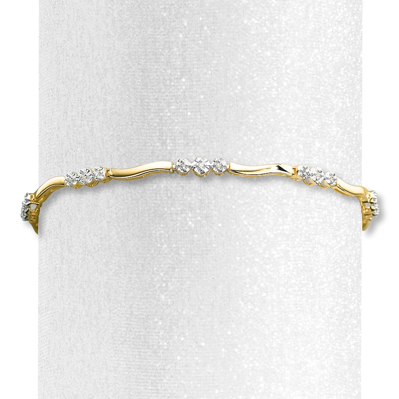Main Image 1 of Previously Owned Diamond Bracelet 1/8 ct tw Round-cut 10K Yellow Gold 7.5&quot;