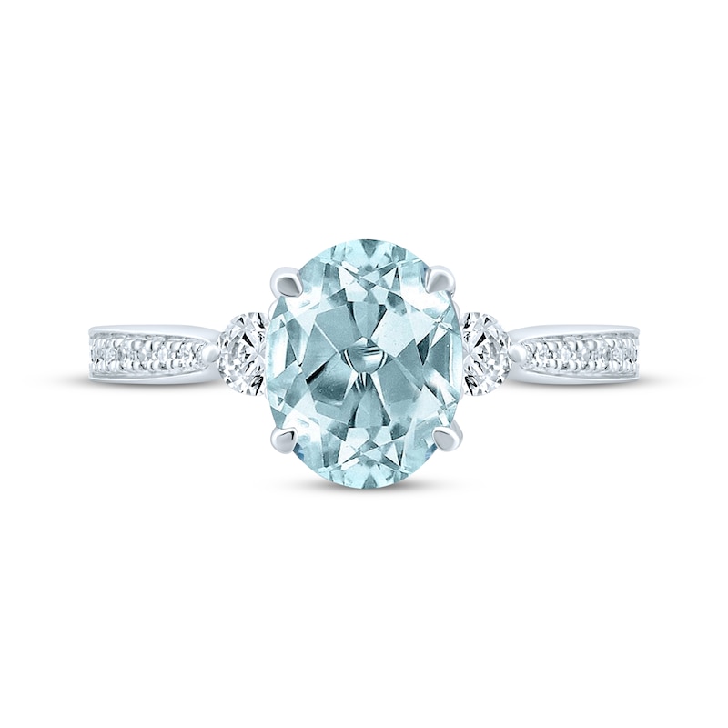 Previously Owned Oval Aquamarine Engagement Ring 1/3 ct tw Round-cut Diamonds 14K White Gold