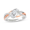 Thumbnail Image 1 of Previously Owned Round-Cut Diamond Three-Stone Braided Bypass Engagement Ring 5/8 ct tw 14K Two-Tone Gold