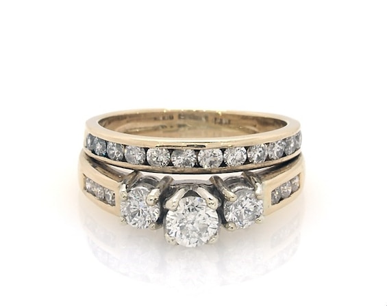 Previously Owned Round-Cut Diamond Three-Stone Bridal Set 1-1/2 ct tw 14K Two-Tone Gold & 10K Yellow 6.5