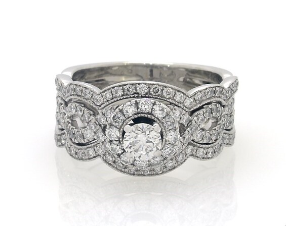 Previously Owned Neil Lane Round-Cut Diamond Halo Bridal Set 1-1/3 ct tw 14K White Gold Size 7