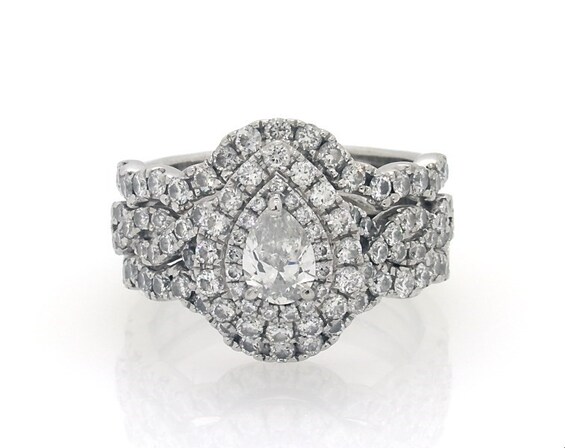 Previously Owned Neil Lane Pear-Shaped Diamond Double Halo Bridal Set 1-7/8 ct tw 14K White Gold Size 7