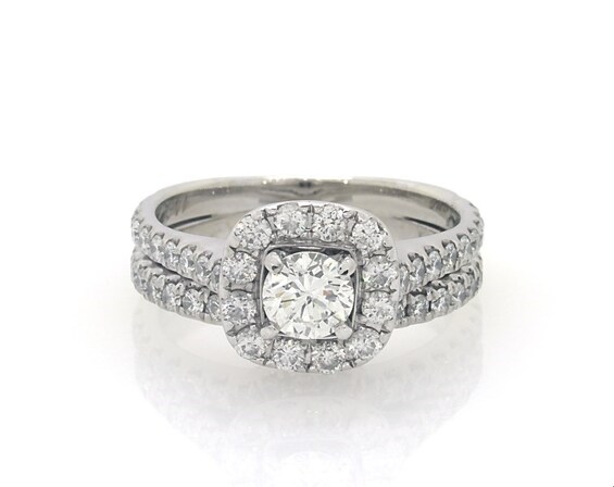 Previously Owned Neil Lane Round-Cut Diamond Halo Bridal Set 1-3/8 ct tw 14K White Gold Size 6