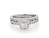 Thumbnail Image 1 of Previously Owned Monique Lhuillier Bliss Round-Cut Diamond Halo Bridal Set 1-1/6 ct tw 18K White Gold Size 6