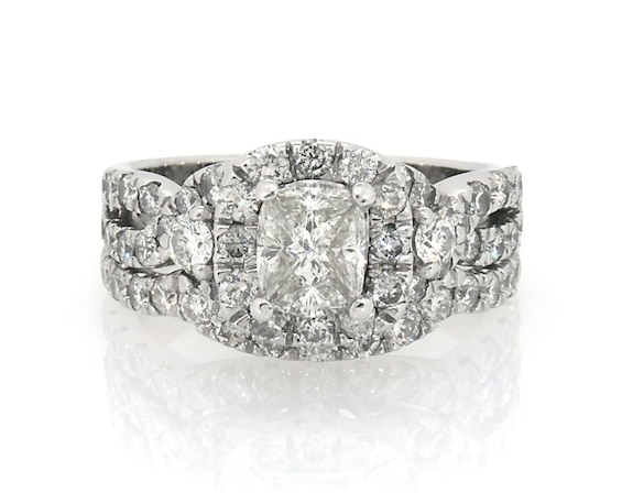 Previously Owned Multi-Diamond Center Halo Bridal Set 1-/ ct tw 14K White Gold Size