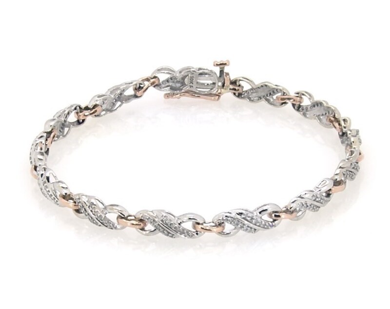 Main Image 1 of Previously Owned Diamond Infinity Bracelet 1/2 ct tw 10K Two-Tone Gold