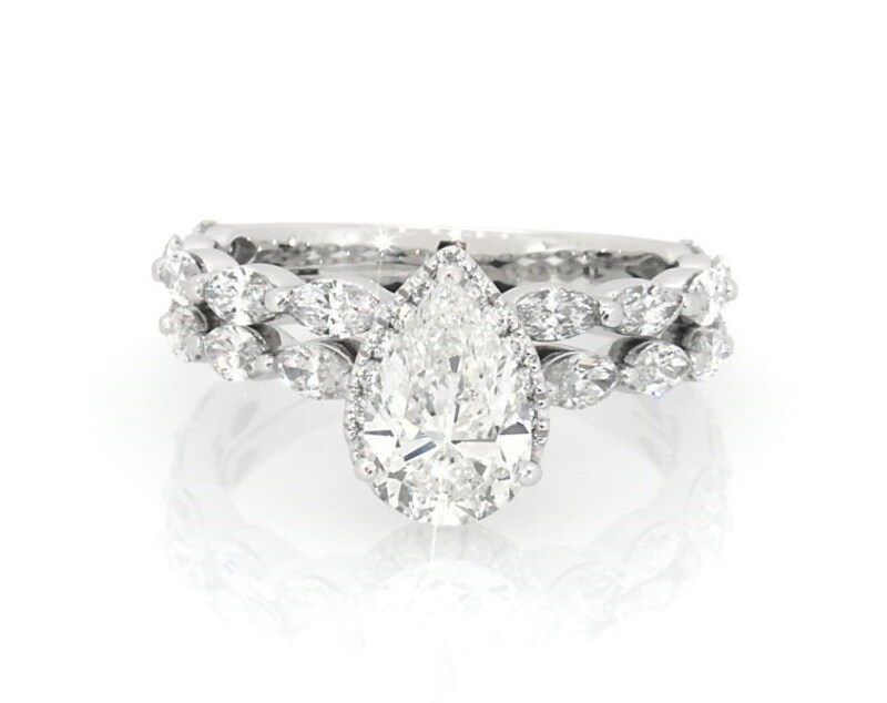 Main Image 1 of Previously Owned Neil Lane Premiere Pear-Shaped Diamond Halo Bridal Set 2-1/4 ct tw 14K White Gold Size 5