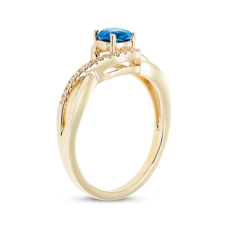 Main Image 2 of Swiss Blue Topaz & Diamond Bypass Ring 1/15 ct tw 10K Yellow Gold