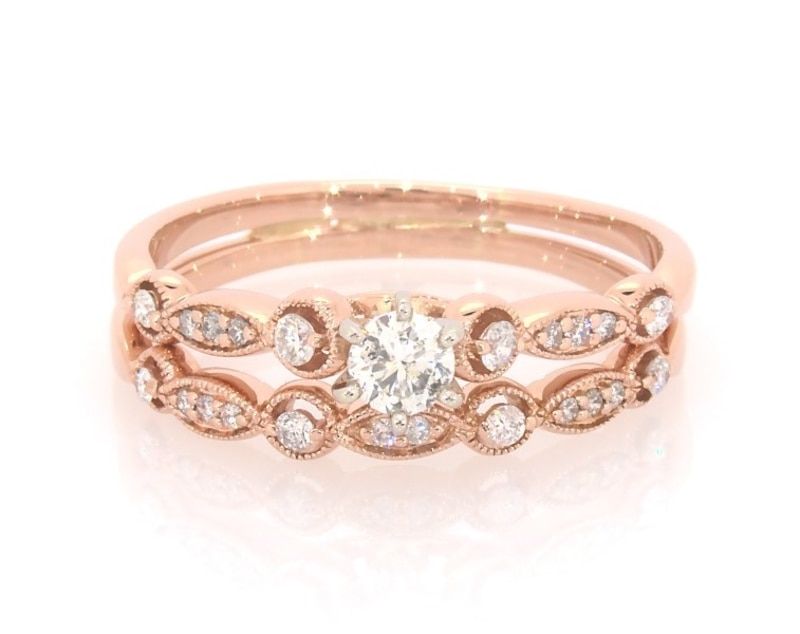 Main Image 1 of Previously Owned Round-Cut Diamond Bridal Set 1/2 ct tw 14K Rose Gold Size 10