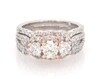 Thumbnail Image 1 of Previously Owned THE LEO Round-Cut Diamond Three-Stone Halo Bridal Set 1-7/8 ct tw 14K Two-Tone Gold Size 6.5