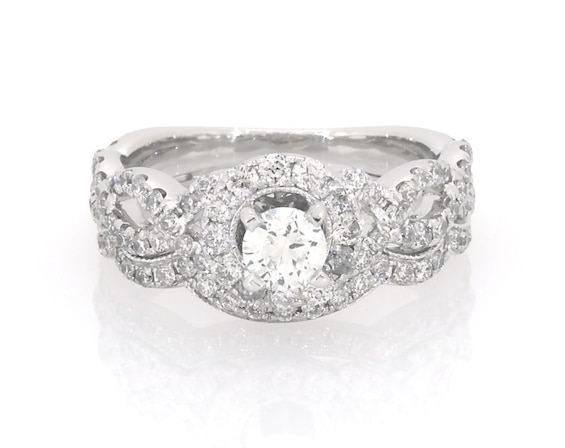 Previously Owned Neil Lane Round-Cut Diamond Halo Bridal Set 1-1/5 ct tw 14K White Gold 5.75