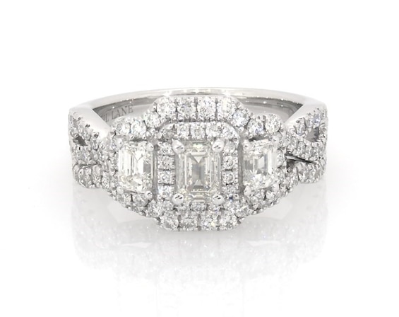 Previously Owned Neil Lane Emerald-Cut Diamond Three-Stone Halo Bridal Set 1-7/8 ct tw 14K White Gold Size 7.75