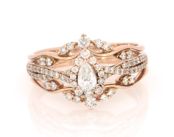 Previously Owned Pear-Shaped Diamond Halo Bridal Set 5/8 ct tw 14K Rose Gold Size 8