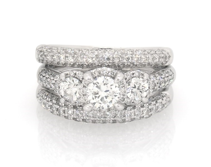 Main Image 1 of Previously Owned Round-Cut Diamond Three-Stone Halo Bridal Set 1-3/4 ct tw 14K White Gold Size 6.25