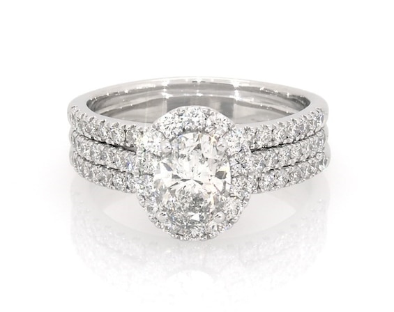 Previously Owned Neil Lane Oval-Cut Diamond Halo Bridal Set 2-3/8 ct tw 14K White Gold Size 10