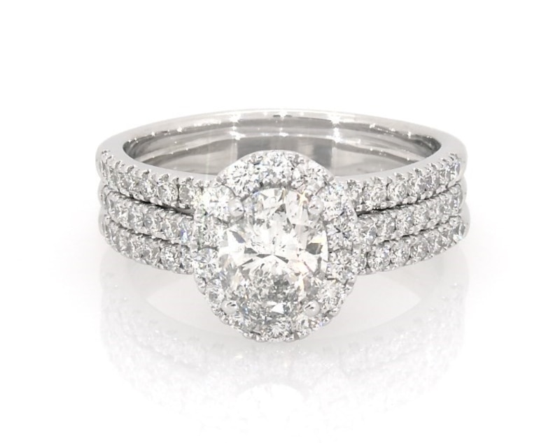 Main Image 1 of Previously Owned Neil Lane Oval-Cut Diamond Halo Bridal Set 2-3/8 ct tw 14K White Gold Size 10