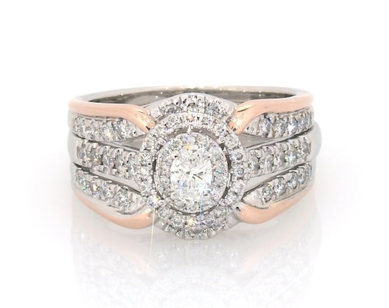 Previously Owned Oval-Cut Diamond Double Halo Bridal Set 3/4 ct tw 14K Two-Tone Gold Size 6.5