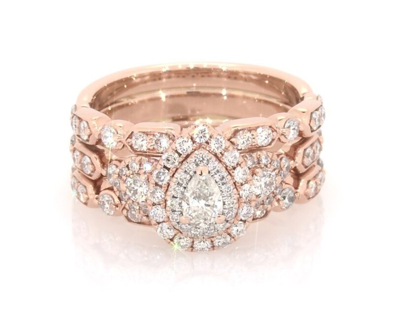Main Image 1 of Previously Owned Pear-Shaped Diamond Double Halo Bridal Set 1-1/4 ct tw 14K Rose Gold Size 6.75