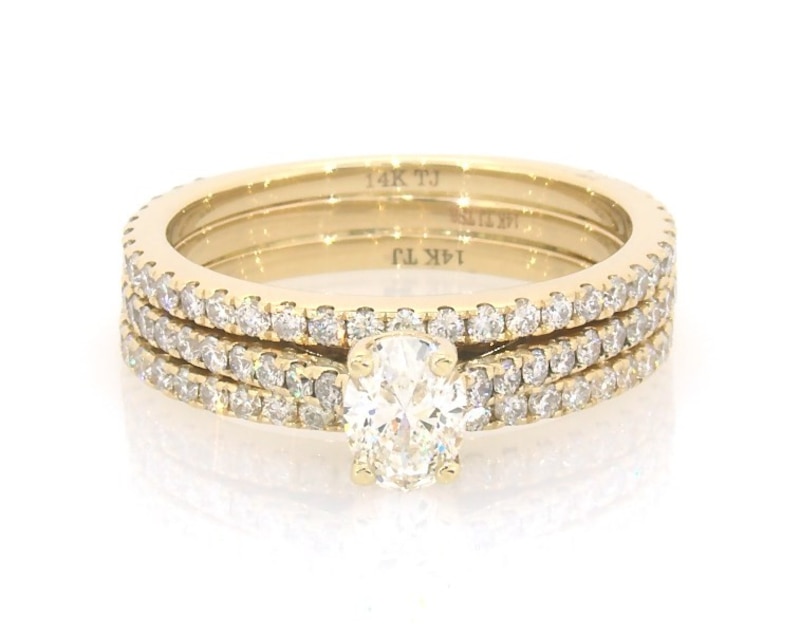 Main Image 1 of Previously Owned Oval-Cut Diamond Bridal Set 1-1/4 ct tw 14K Yellow Gold Size 7.25