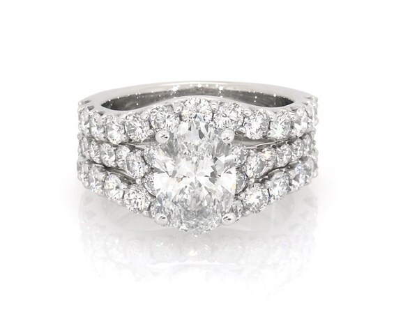 Previously Owned Oval-Cut Lab-Grown Diamond Bridal Set 3-3/8 ct tw 14K White Gold Size 4.75