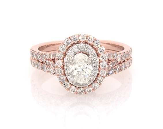 Previously Owned Neil Lane Oval-Cut Diamond Halo Bridal Set 1-1/2 ct tw 14K Two-Tone Gold Size 7.5