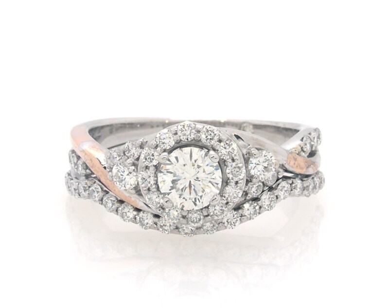 Main Image 1 of Previously Owned THE LEO Diamond Round-Cut Halo Bridal Set 1-1/5 ct tw 14K Two-Tone Gold Size 7.5