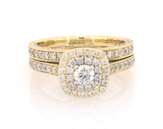 Previously Owned Neil Lane Bridal Set 1 ct tw Diamonds 14K Yellow Gold Size 7.75