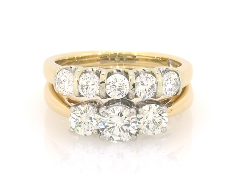 Main Image 1 of Previously Owned THE LEO Diamond Round-Cut Three-Stone Bridal Set 1-1/2 ct tw 14K Two-Tone Gold & Platinum Size 6