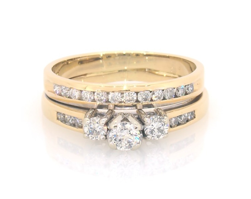 Main Image 1 of Previously Owned Round-Cut Three-Stone Diamond Bridal Set 5/8 ct tw 14K Yellow Gold Size 8