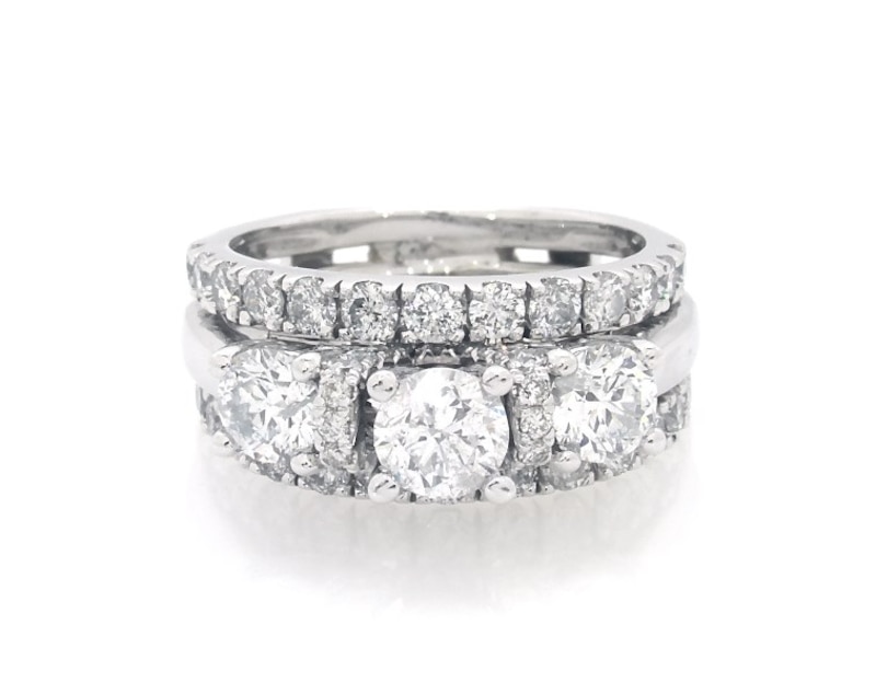 Main Image 1 of Previously Owned Round-Cut Three-Stone Diamond Bridal Set 2-1/3 ct tw 14K White Gold Size 5.75